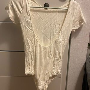 Lulu’s cream bodysuit. Never worn but clipped the tags off